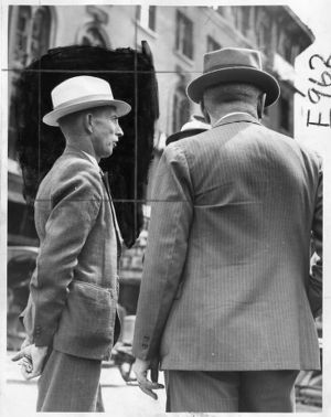 Family members wait for their relative's bodies to be brought out of the Termial Hotel Fire disaster, Atlanta, Georgia, after May 16, 1938.
