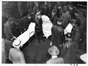 Medical personnel and fire fighters removing bodies from the Terminal Hotel Fire, Atlanta,Georgia, May 17, 1938