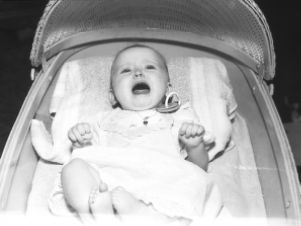 Baby in a bassinet, Atlanta, Georgia, circa 1950s.