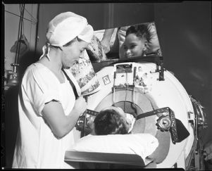 Child in an iron lung, Grady Hospital, Atlanta, Georgia, circa 1940s.