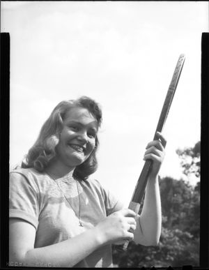 Pollie Lacour modeling with a tennis racket, Atlanta, Georgia, May 1946.