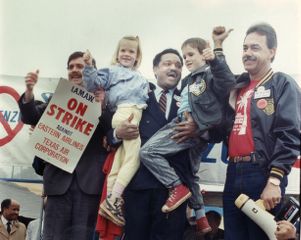IAM members and Jesse Jackson picketing against Eastern Airlines during a strike, Atlanta, Georgia, 1989.