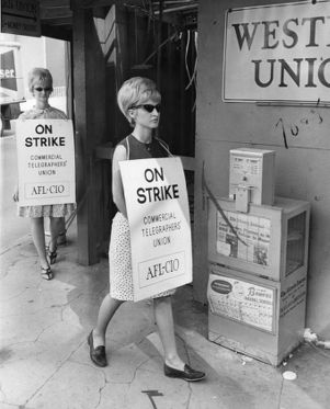 Union members picket outside a Western Union office, Atlanta, Georgia, 1966.