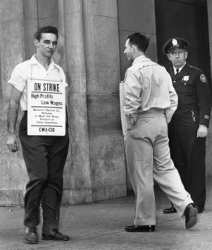 Picketing telephone workers outside Southern Bell headquarters, Atlanta, Georgia, April 1947.