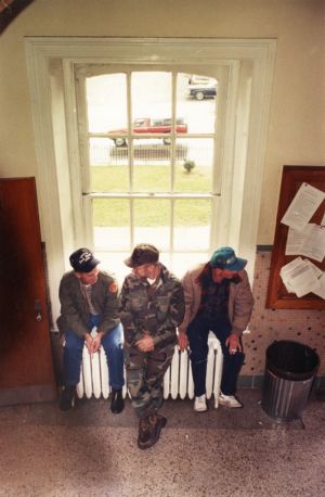 Striking coal miners warming up in the courthouse where fellow union members are on trial, Russell County, Virginia, November 19, 1989.