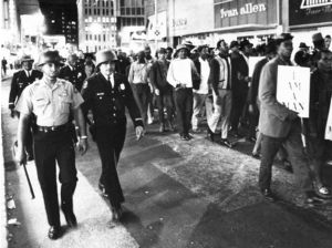 Striking city workers marching with police escorts, Atlanta, Georgia, April 1970.