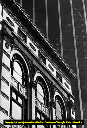 First National Bank towers over older surrounding buildings, 1968