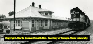 Freight train passes by the old Norcross Depot, 1988