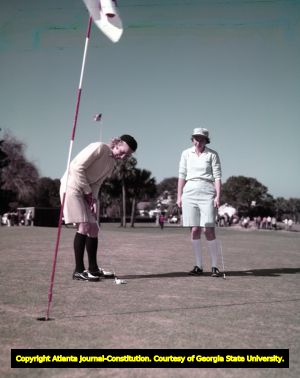 Mickey Wright putting at the Sea Island golf tournament, 1958