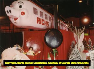 Rich's department store's Christmas event, the Pink Pig, a child-scaled monorail train-ride, came to the downtown Atlanta, Georgia store in the 1950s, and was moved to the "Festival of Trees" at the Georgia World Congress Center in the 1990s after the downtown store closed in 1991, Atlanta, Georgia, November 1994.
