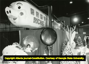 Rich's department store's Christmas event, the Pink Pig, a child-scaled monorail train-ride, came to the downtown Atlanta, Georgia store in the 1950s, and was moved to the "Festival of Trees" at the Georgia World Congress Center in the 1990s after the downtown store closed in 1991, Atlanta, Georgia, November 1994.