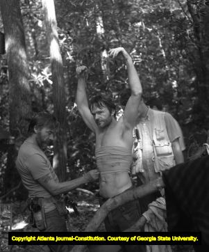 Bill McKinney on the set of "Deliverance" preparing for death scene, 1971