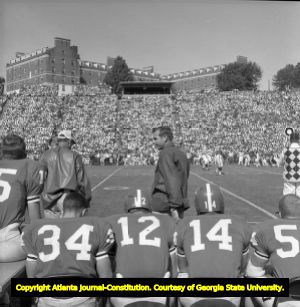 Georgia Bulldogs football coach Vince Dooley on the sidelines during a game, 1965