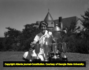 Dorothy Kirby with her golf trophies, 1941