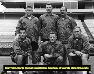Atlanta Falcons staff Bob Fry, Hal Herring, John Symank, Tom Fears, circa 1960s