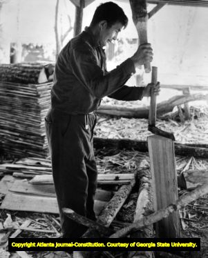 Cherokee Indian Hayes Lossie making wooden shingles, Cherokee, North Carolina, 1969.