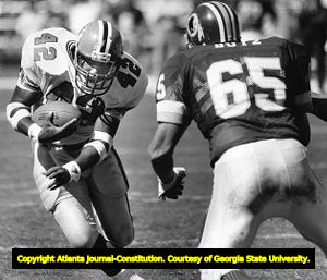 Gerald Riggs jukes a Redskins defender, 1987