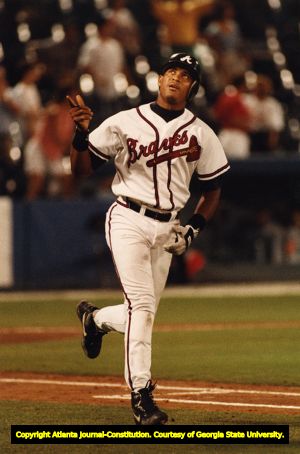 Francisco Cabrera rounds the bases after hitting a grand slam, 1993