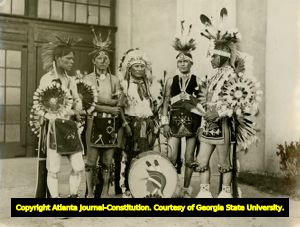 Five Navaho Indian men dressed in traditional garments, 1930s?