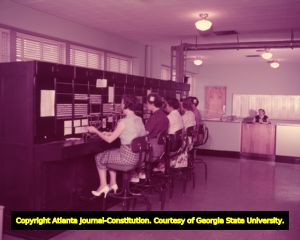Women operators working in the communication room at Grady Hospital, 1958