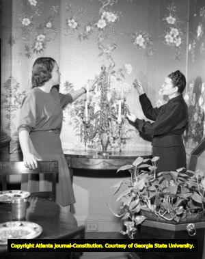 Women interior designers discuss wallpaper, circa 1940s