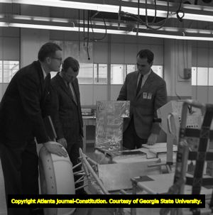 Lunar Rover Vehicle is inspected by NASA employees, 1970