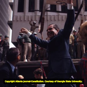 Richard Nixon during a presidential campaign parade, 1968