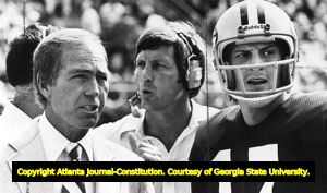 Bart Starr, Bill Curry and Quarterback David Whitehurst on the Green Bay Packers sideline during a game against the Falcons, 1979
