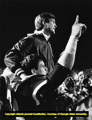 Georgia Tech coach Bill Curry carried off the field by his players after beating Georgia, 1985