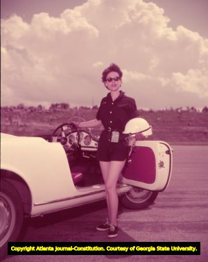 Woman sports car racer in the Belle's Classic, 1957