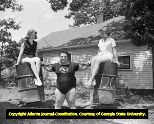 Paul Anderson lifts over 2400lbs during a training session, 1955