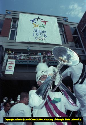 Marching band performs at an Olympic pep rally in Underground Atlanta, 1990