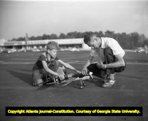 Young boys prepare their model airplanes for the Atlanta Team Racing Club, 1955