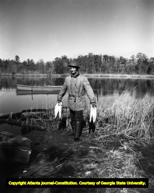 Fisherman bringing in the catch at St. Mary's, 1951