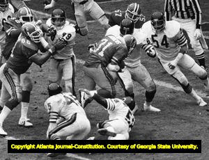 Falcons' William Andrews breaks tackles against the Chicago Bears, 1980