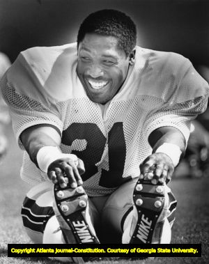 Atlanta Falcons' William Andrews stretching before practice, 1987
