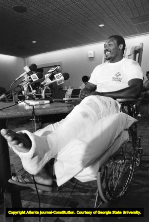 Atlanta Falcons' William Andrews during a press conference on his injured knee, 1984