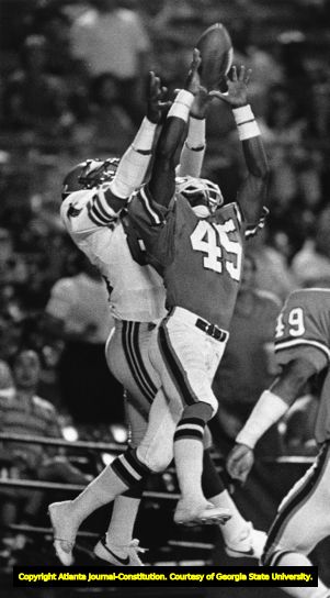 Falcons' Alfred Jackson makes a catch to score a touchdown against Denver Broncos, 1984