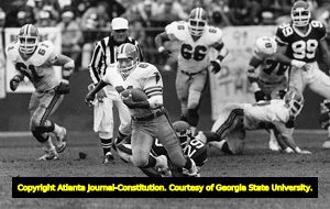 Falcons' Billy "White Shoes" Johnson returns a punt against the New York Jets, 1983