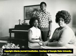 Civil rights pioneer, Mrs. Linda Brown Smith, with her two children Kimberley and Charles, Topeka, Kansas, April 1974.