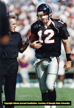 Falcons' quarterback Chris Miller is injured during a game against the Rams, 1991