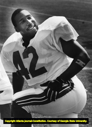 Gerald Riggs stretching during the Falcons' practice, 1988
