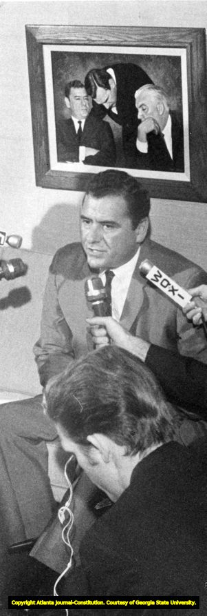 Rankin Smith at a press conference over Norb Hecker's dismissal from the Falcons, 1968