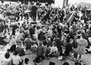Henry Sopkin with the Atlanta Symphony Orchestra perfroming for a group of children, circa 1960s