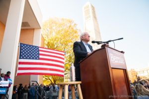 Bernie Sanders looks out at the crowd from his podium