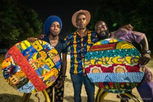 Musicians from the parade stand posing with their instruments