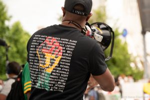 Marcus Coleman wears victims of police brutality shirt