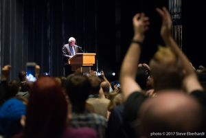 Bernie Sanders speaks to a crowd while at an event to promote his new book