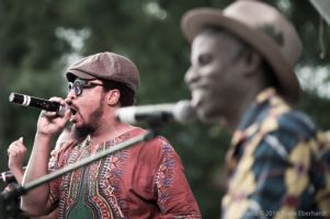 Dashill Smith and Mausiki Smith sing for their audience; StillImage