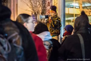 A protestor speaks to the group of protestors at Underground Atlanta